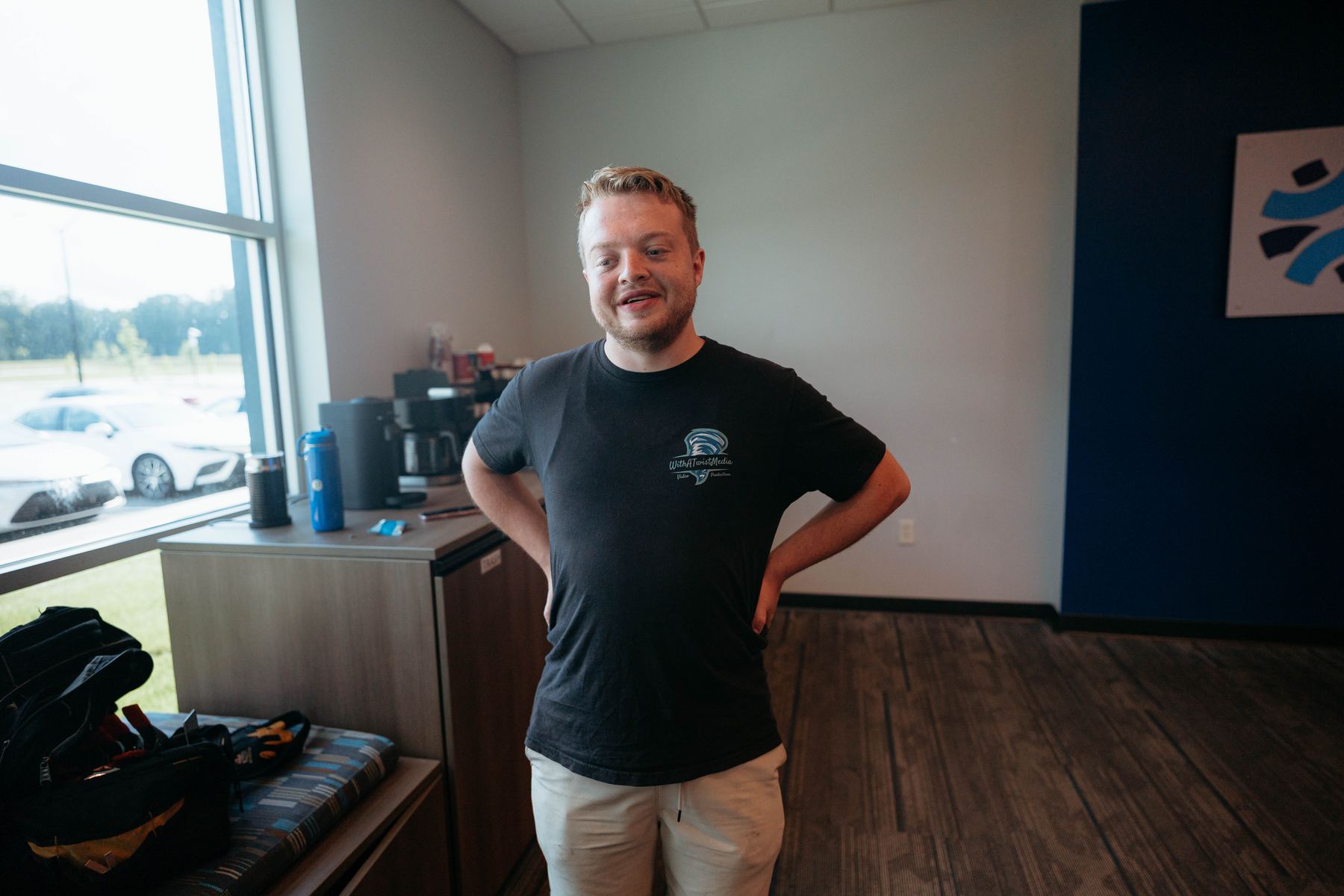 Dylan Smith smiling between setups on a shoot day